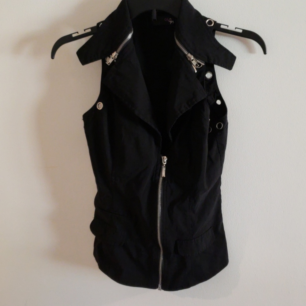 Black vest shirt. Purchased at a Harley rally.